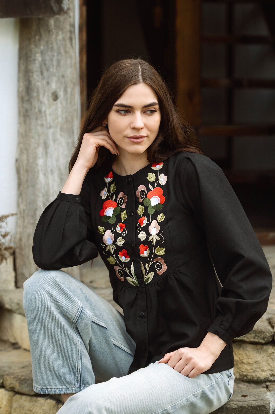Black Blouse With Delicate Pastel Embroidery And Decorative Buttons