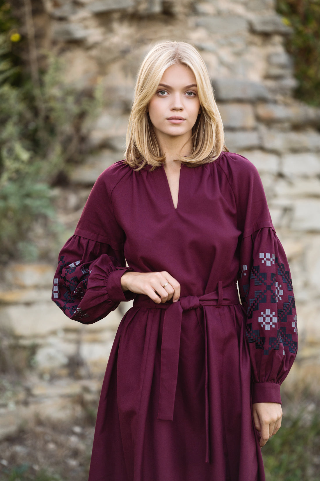 Burgundy Dress With An Embroidered Ornament On The Sleeves