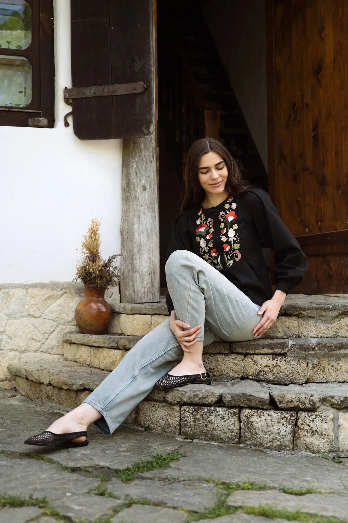 Black Blouse With Delicate Pastel Embroidery And Decorative Buttons Ornament