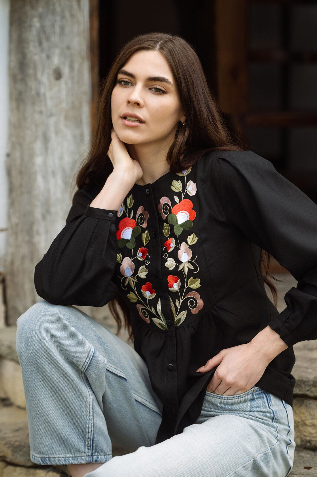 Black Blouse With Delicate Pastel Embroidery And Decorative Buttons Ornament