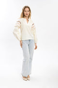Elegant Cream-Colored Blouse With Ethnic Accents On The Sleeves Ornament