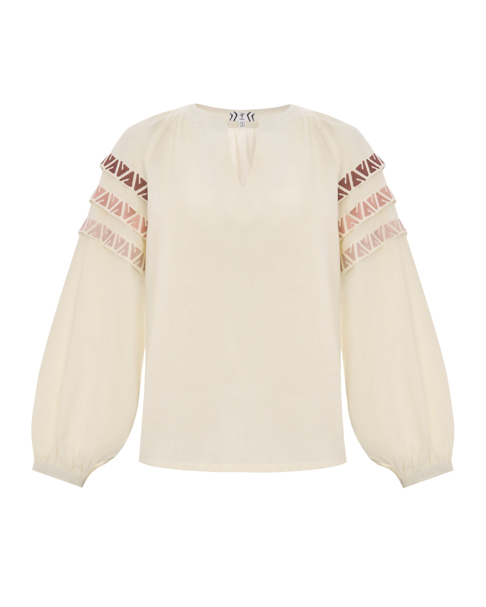 Elegant Cream-Colored Blouse With Ethnic Accents On The Sleeves Ornament