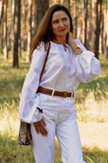 Women's Embroidered Blouse With Elegant Volumetric White Embroidery On A White Background Ornament