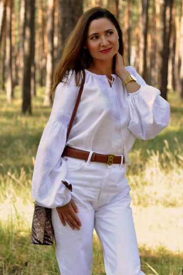 Women's Embroidered Blouse With Elegant Volumetric White Embroidery On A White Background Ornament
