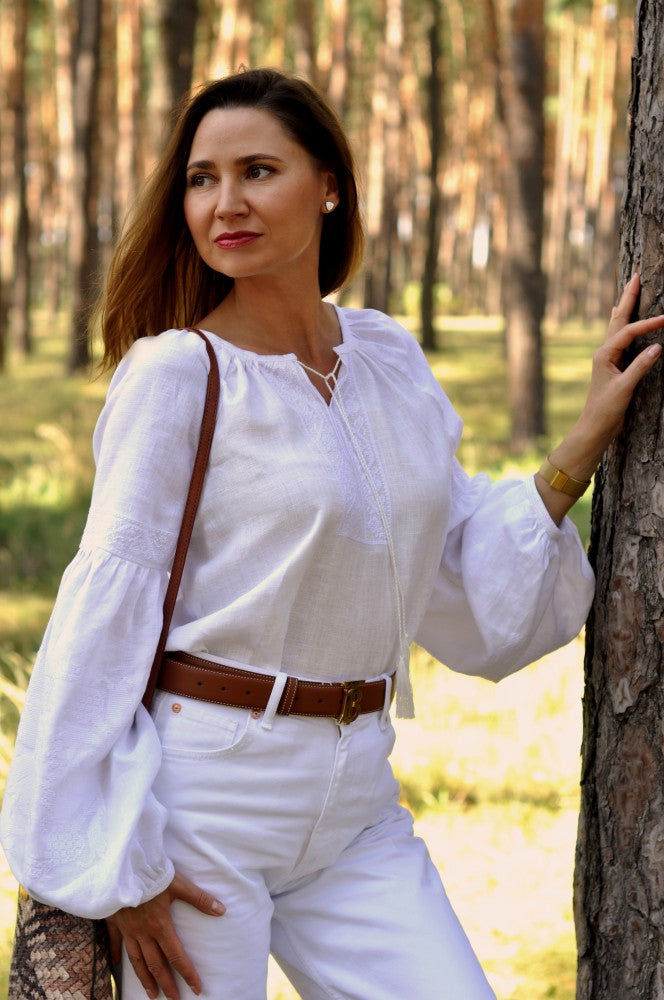 Women's Embroidered Blouse With Elegant Volumetric White Embroidery On A White Background Ornament