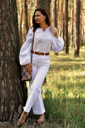 Women's Embroidered Blouse With Elegant Volumetric White Embroidery On A White Background Ornament